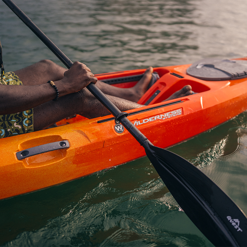Kayak and paddle on the water