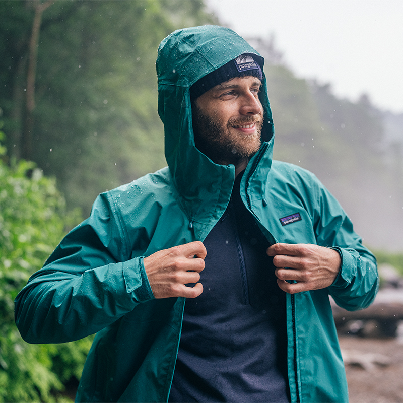 Make hiker wearing a rain jacket in the rain